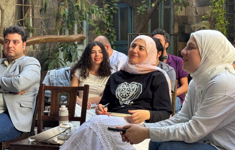 Syrian journalists attend a free media training event in the capital Damascus.
