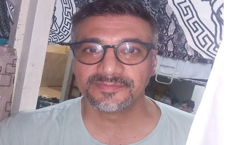 A rare image of Reza Valizadeh, inside Fashafouyeh Prison, where he was held in overcrowded halls alongside inmates convicted of general crimes. (Photo: Courtesy of Valizadeh family)